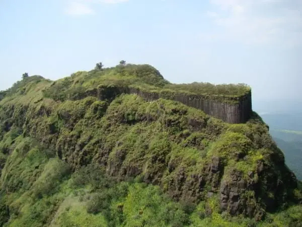 Trekking through green hill station trails in Saputara
