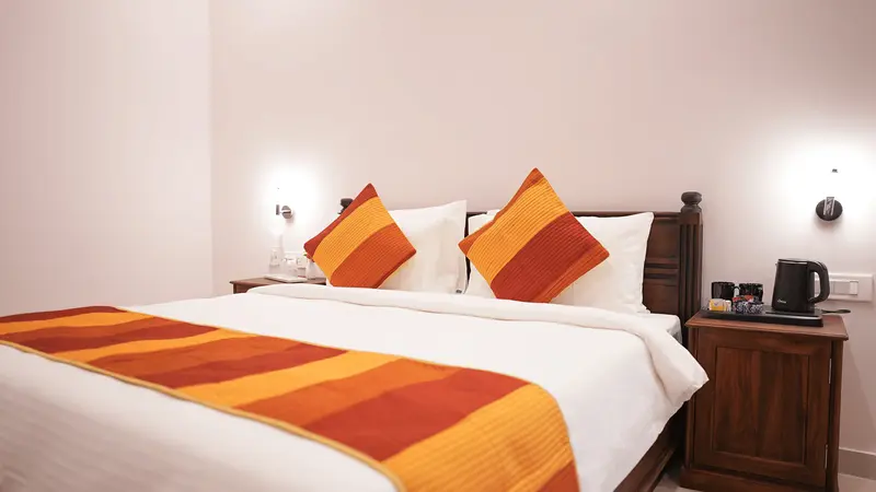 Elite Suite with luxurious bedding and furniture